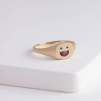 Small happy face signet ring