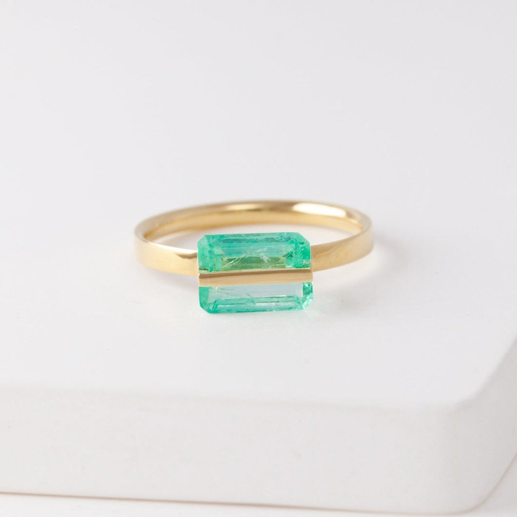 Band one-of-a-kind emerald ring