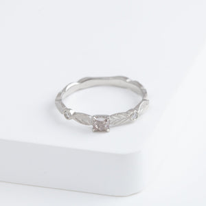 Bloom platinum ring with one-of-a-kind brown diamond