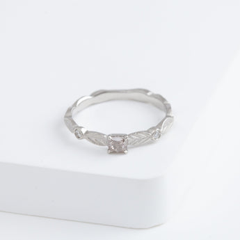 Bloom platinum ring with one-of-a-kind brown diamond
