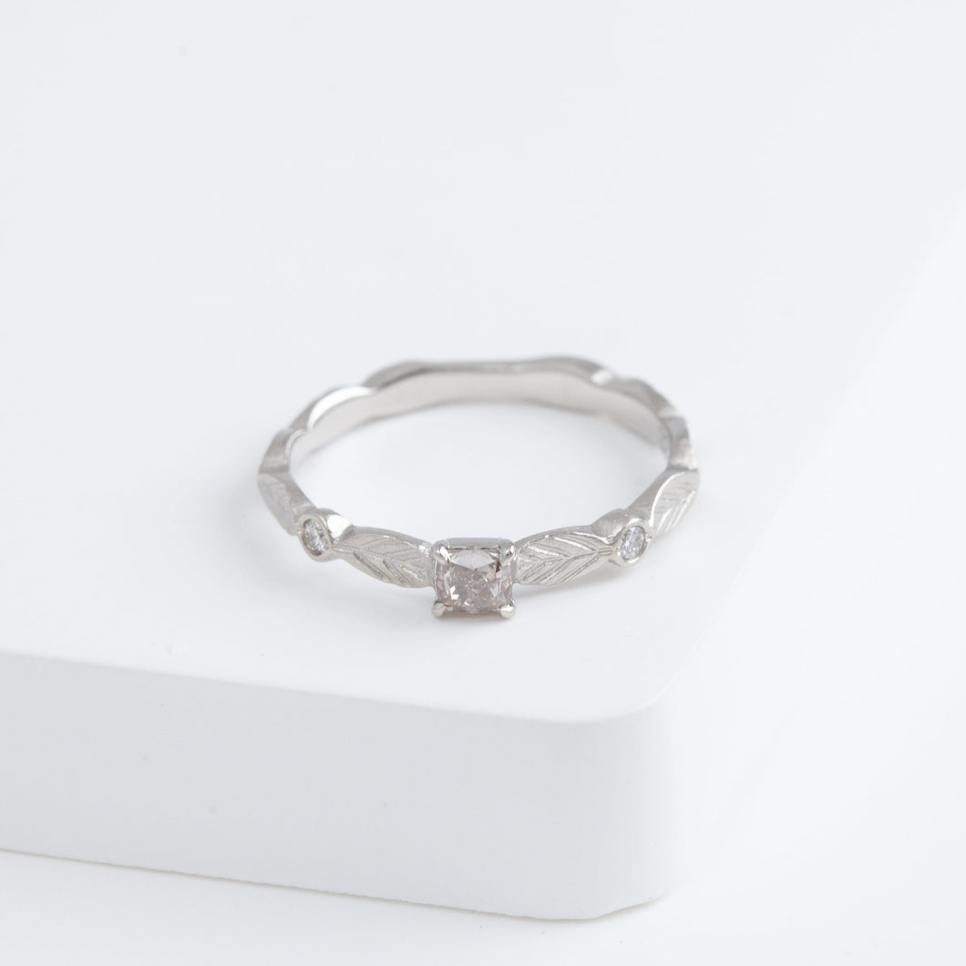 Bloom platinum ring with one-of-a-kind brown diamond