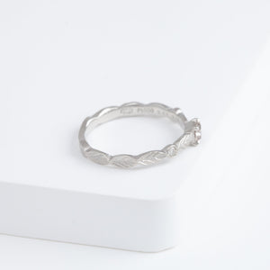 Bloom platinum ring with one-of-a-kind brown diamond