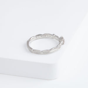 Bloom platinum ring with one-of-a-kind brown diamond