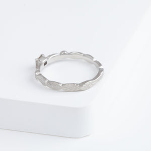 Bloom platinum ring with one-of-a-kind brown diamond