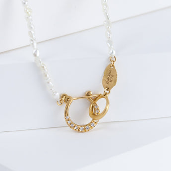 Hung necklace with Sazare small white akoya pearl (#6065)