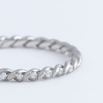 Twist diamonds platinum ring