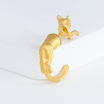 Cat through earring