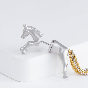 Horse through rhodium plated silver earring