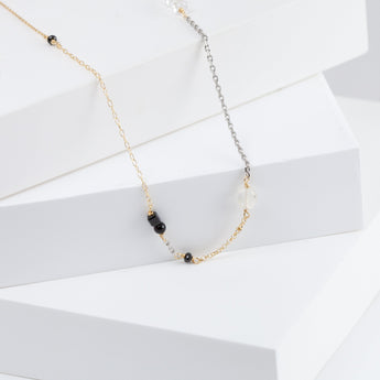 Mixed metal chain necklace with monotone gemstones