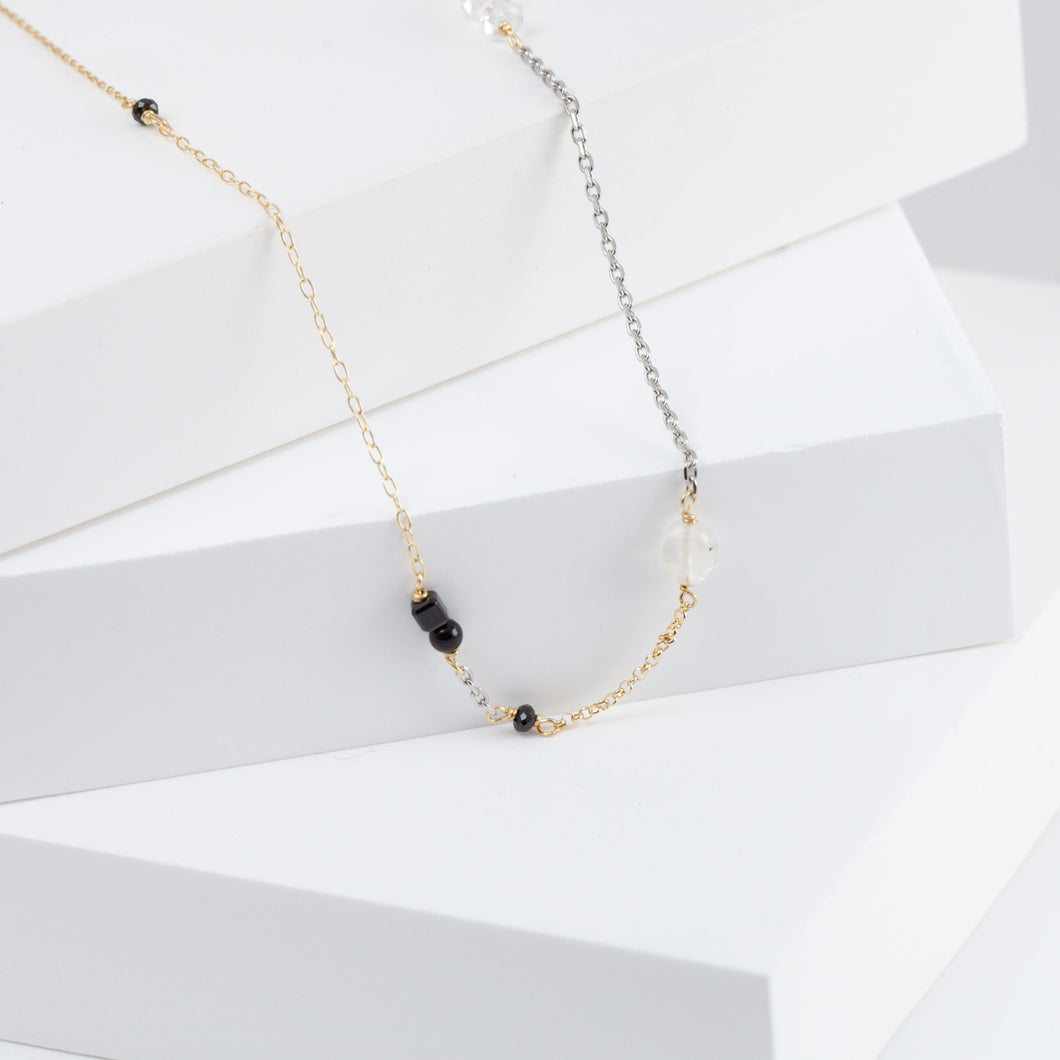 Mixed metal chain necklace with monotone gemstones