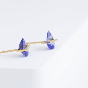 Band pear tanzanite studs