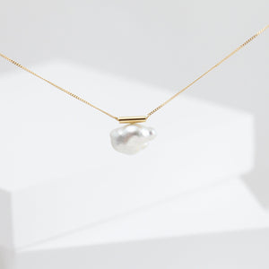 Large white baroque pearl necklace