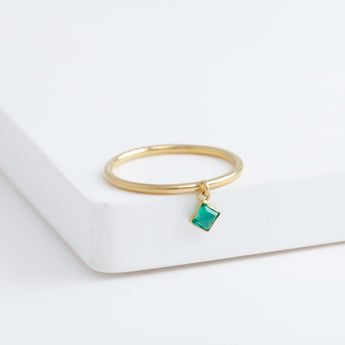 Swinging square emerald ring