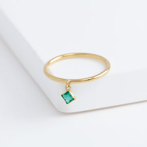 Swinging square emerald ring