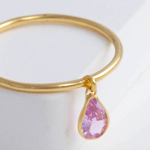 Swinging pear pink sapphire ring