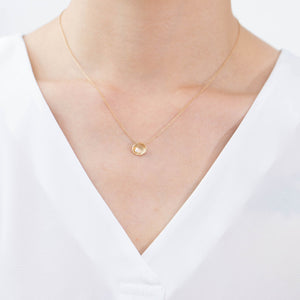 Gold petal necklace with pearl