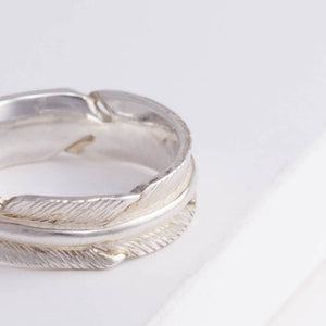 Silver infinity feather ring