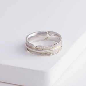 Silver infinity feather ring